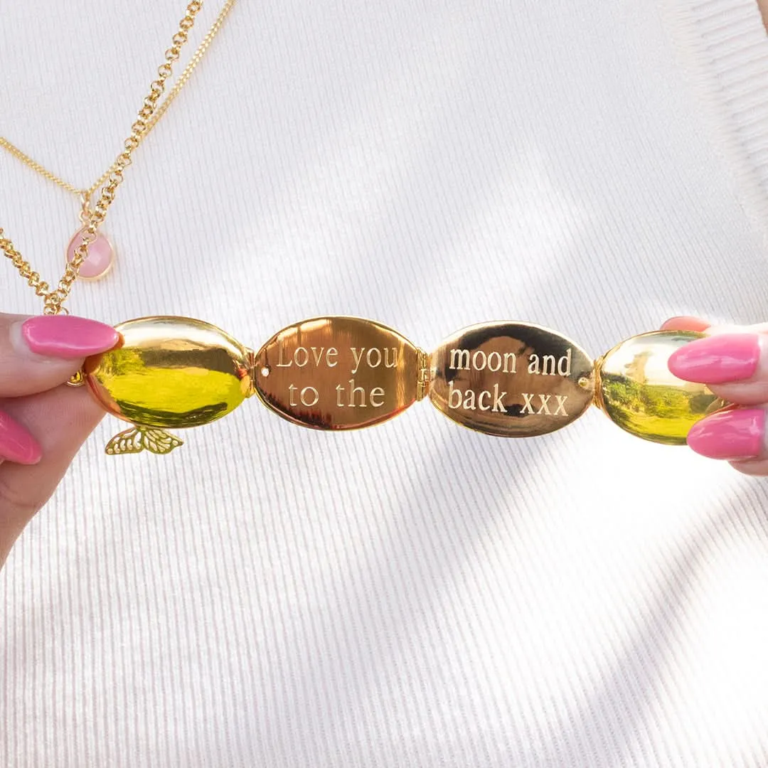 Four Photo Oval Butterfly Locket Gold   Photos